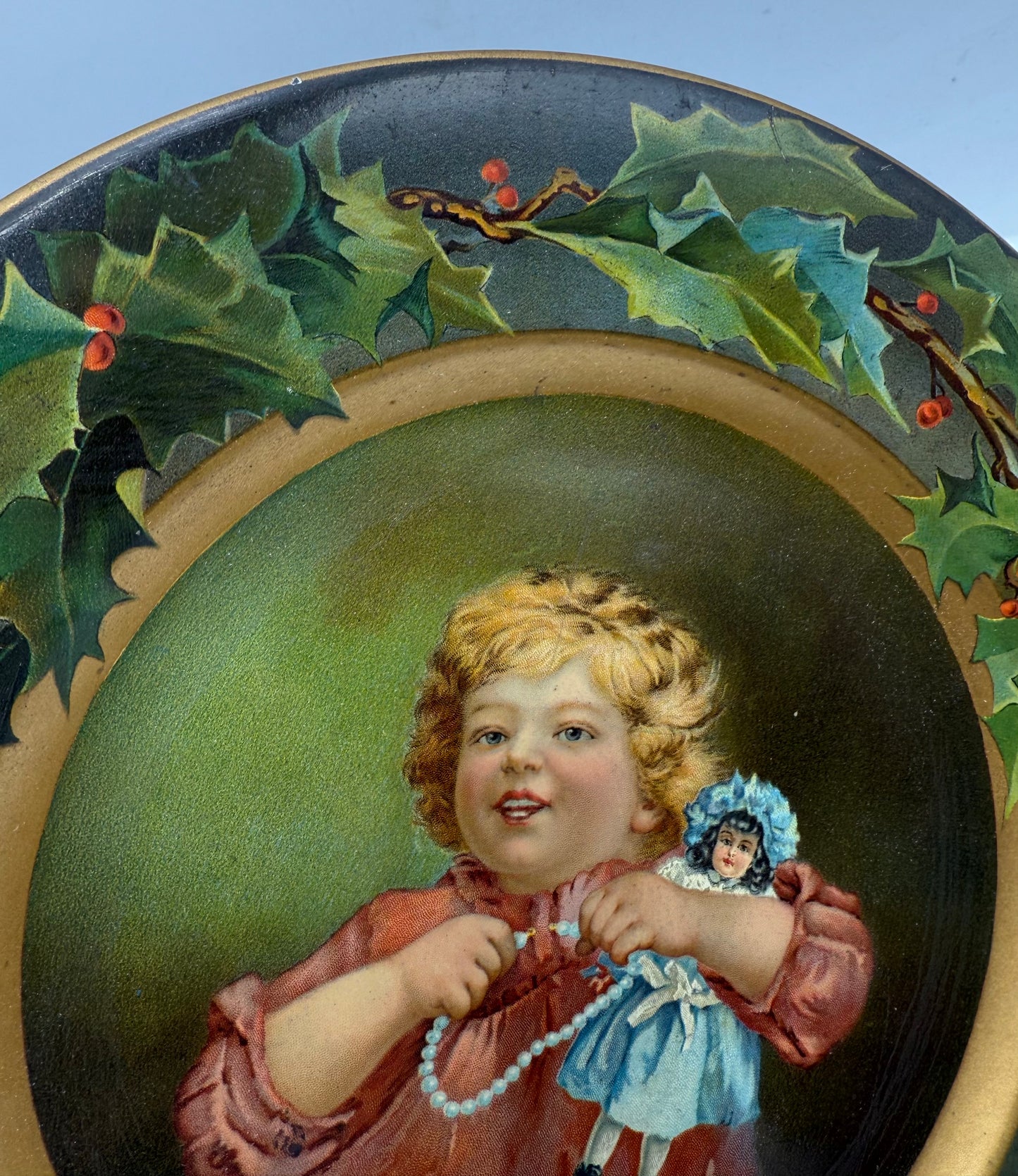 C.D. Kenny Tin Litho Christmas Holly Plate Girl with Doll and Pearls Advertising Premium for Coffee and Tea